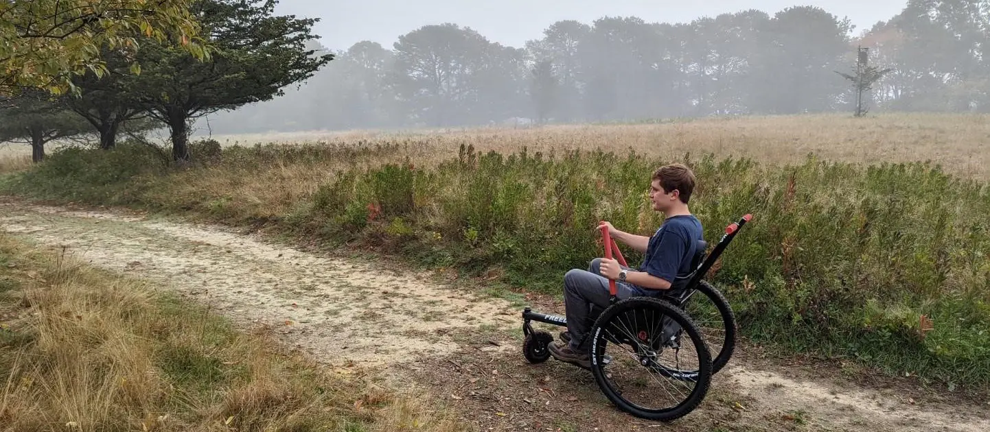 Freedom Chair on trail at Felix Neck